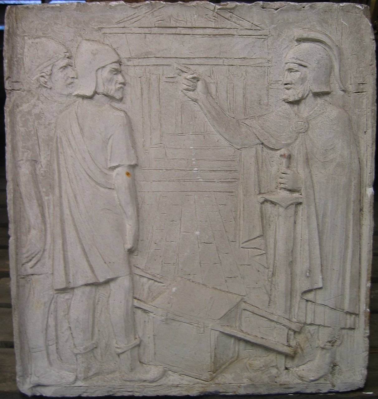 Gipsrelëf met drie Romeinse soldaten en een draagbaar